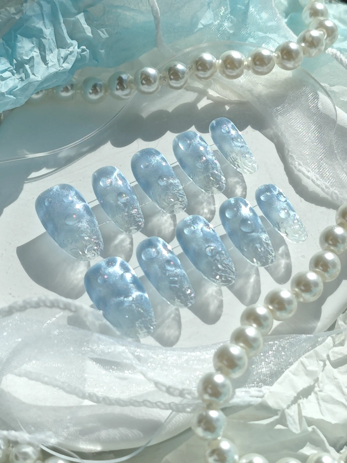 Icy Blue Water Bubble Shimmer Medium Tapered Square Nails