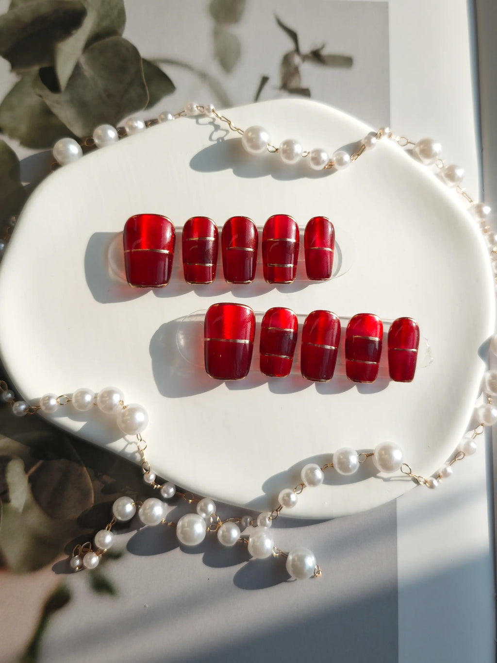 Red Cat‑Eye Gold Line French Medium Square Nails