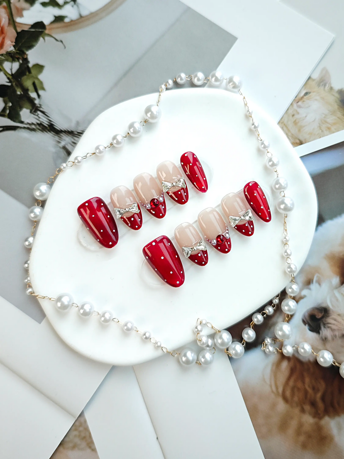 Red Polka‑Dot Silver Bow French Medium Almond Nails