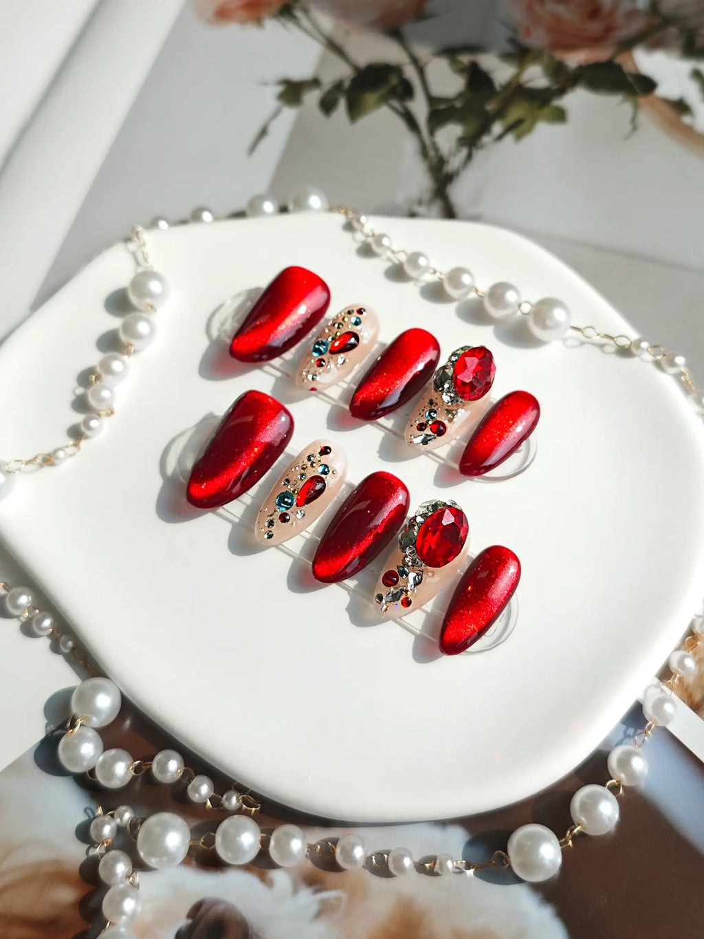 Red Cat‑Eye Multi‑Gem Medium Almond Nails
