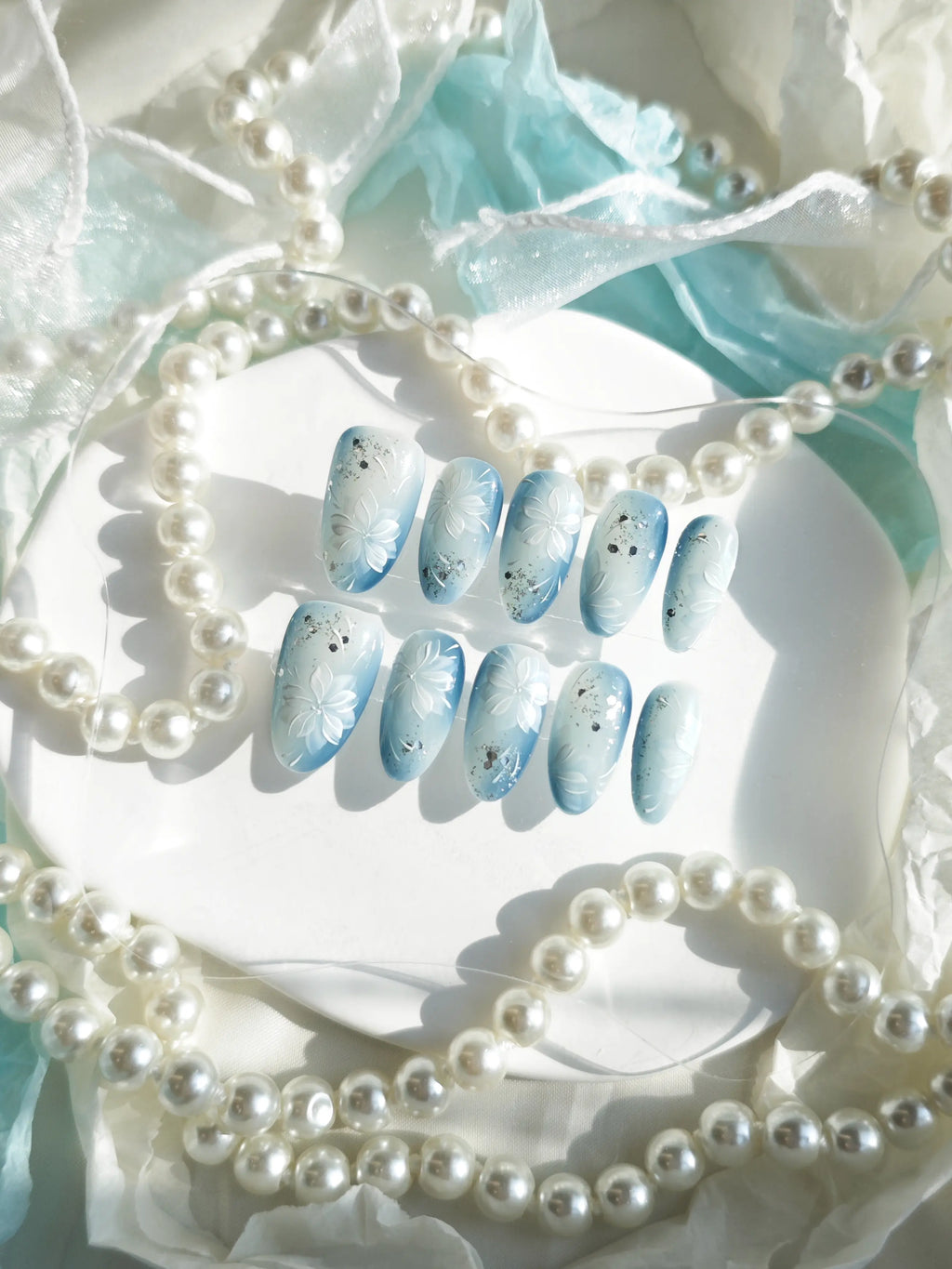 Soft Blue Gradient 3D White Flower Medium Almond Nails