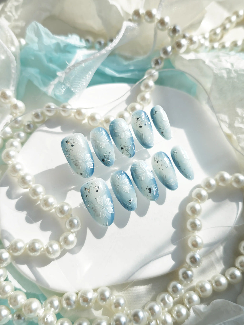 Soft Blue Gradient 3D White Flower Medium Almond Nails