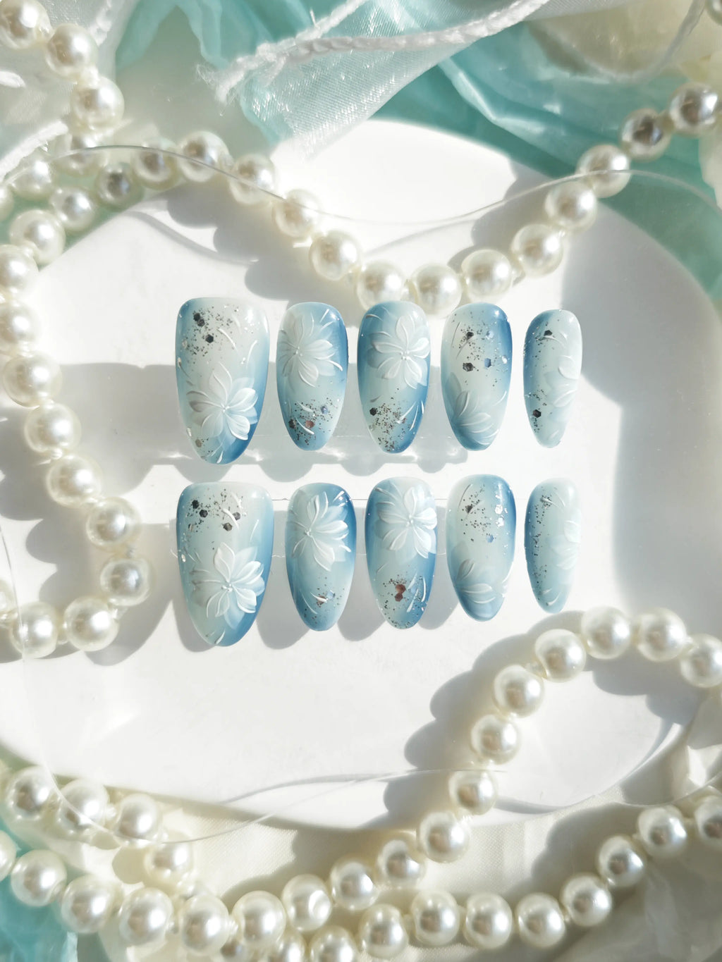 Soft Blue Gradient 3D White Flower Medium Almond Nails